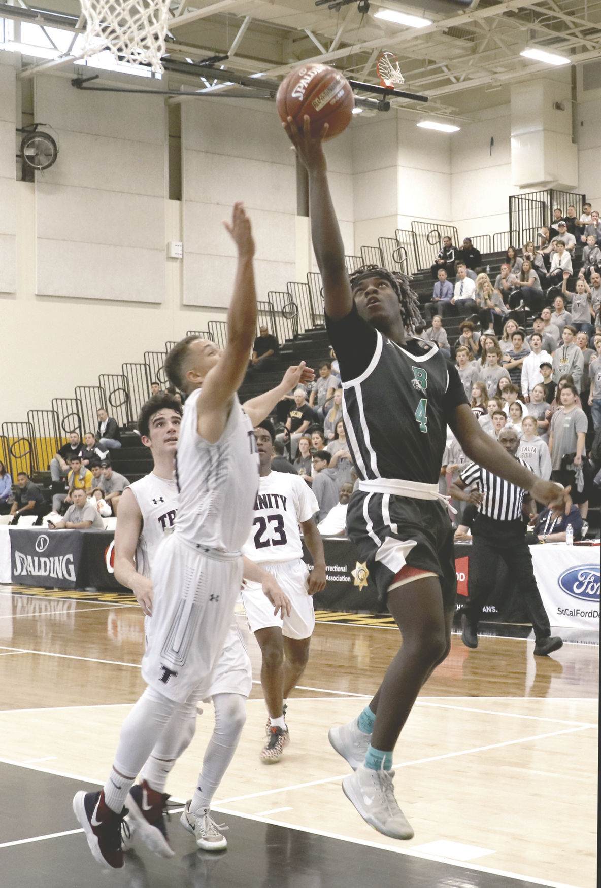 Bronco AJ Anderson goes up for two in the fourth quarter.